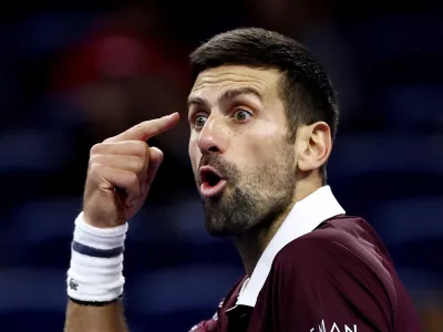 Tennis - China Open - National Tennis Center, Beijing, China - October 4, 2026 Serbia's Novak Djokovic reacts during his quarterfinal match against Germany's Alexander Zverev REUTERS/Tingshu Wang