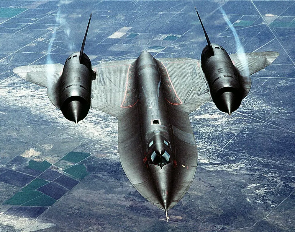 The SR-71, unofficially known as the "Blackbird," is a long-range, advanced, strategic reconnaissance aircraft developed from the Lockheed A-12 and YF-12A aircraft. The first flight of an SR-71 took place on December 22, 1964, and the first SR-71 to enter service was delivered to the 4200th (later, 9th) Strategic Reconnaissance Wing at Beale AFB, California, in January 1966. The U.S. Air Force retired its fleet of SR-71s on January 26, 1990, because of a decreasing defense budget and high costs of operation. The USAF returned the SR-71 to the active Air Force inventory in 1995 and began flying operational missions in January 1997. Throughout its nearly 24-year career, the SR-71 remained the world's fastest and highest-flying operational aircraft. An air-to-air overhead front view of an SR-71A strategic reconnaissance aircraft. The SR-71 is unofficially known as the "Blackbird."