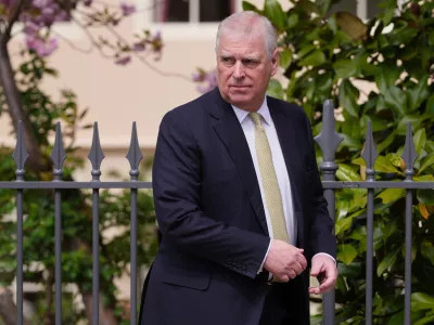 FILE - Britain's Andrew Mountbatten-Windsor, formerly known as Prince Andrew, looks round as he leaves after attending the Easter Matins Service at St. George's Chapel, Windsor Castle, England, April 20, 2025. (AP Photo/Kirsty Wigglesworth, File)