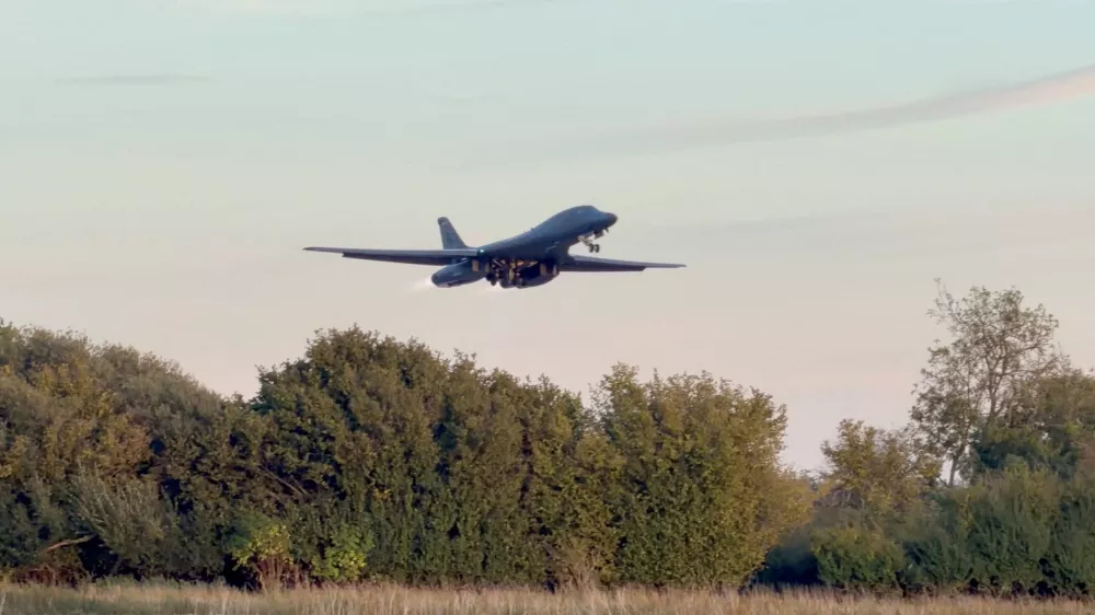 A B-1 bomber takes off from RAF Fairford airbase, as the US removes its B-1 bombers one week after several men were arrested on suspicion of offences under the Explosives Act, in this screengrab obtained from a social media video in Fairford, Gloucestershire, Britain October 4, 2026. @CraigYoungMedia via X/via REUTERS THIS IMAGE HAS BEEN SUPPLIED BY A THIRD PARTY. MANDATORY CREDIT. NO RESALES. NO ARCHIVES. Verification notes: Reuters verified the location and date when the video was recorded from the original file metadata. The trees, utility tower and terrain seen in the video matched archive and satellite imagery of the area. The model of the aircraft was verified from the design of the plane, the engines, the nose and the wings seen in the video, which matched archive imagery of the Rockwell B-1B Lancer.   TPX IMAGES OF THE DAY