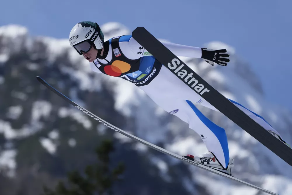 Slovenia's Peter Prevc competes during the Ski Jumping World Cup team competition in Planica, Slovenia, Saturday, March 23, 2024. (AP Photo/Darko Bandic) / Foto: Darko Bandic