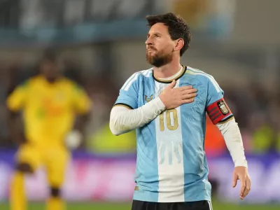 Argentina's Lionel Messi celebrates after scoring his third goal from the penalty spot during his final match for the national team, a soccer friendly against Benin, in Buenos Aires, Argentina, Tuesday, Oct.6, 2026. (AP/Photo/Gustavo Garello)