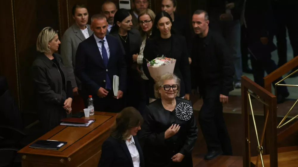 The newly elected President of the Republic of Kosovo Justina Shiroka Pula arrives at the parliament in Pristina, Kosovo, October 7, 2026. REUTERS/Valdrin Xhemaj