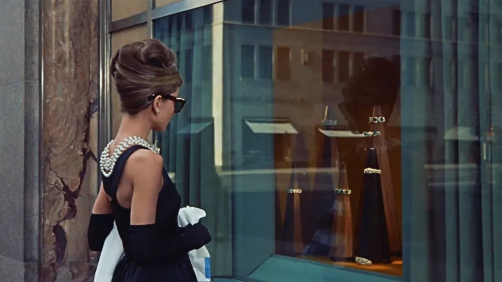 USA. Audrey Hepburn in a scene from the &Acirc;&copy;Paramount Pictures movie: Breakfast at Tiffany's (1961).Plot: A young New York socialite becomes interested in a young man who has moved into her apartment building, but her past threatens to get in the way.Ref: LMK110-J6745-180820Supplied by LMKMEDIA. Editorial Only.Landmark Media is not the copyright owner of these Film or TV stills but provides a service only for recognised Media outlets. pictures@lmkmedia.com,Image: 553723738, License: Rights-managed, Restrictions: Supplied by Landmark Media. Editorial Only. Landmark Media is not the copyright owner of these Film or TV stills but provides a service only for recognised Media outlets. Per la presente foto non Ă&uml; stata rilasciata liberatoria. Ai sensi di legge e come gi, Model Release: no 