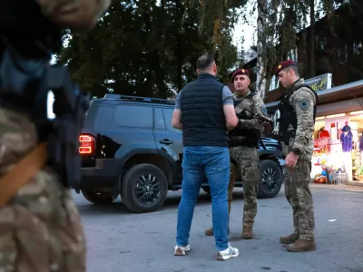 Members of the Special Police Unit of the Zenica-Doboj Canton Ministry of Interior (MUP ZDK) detained a drone operator after locating him using a counter-drone system while he was illegally flying a drone over the stadium ahead of the UEFA Nations League match between Bosnia and Poland in Zenica, Bosnia and Herzegovina, October 5, 2026. REUTERS/Dado Ruvic