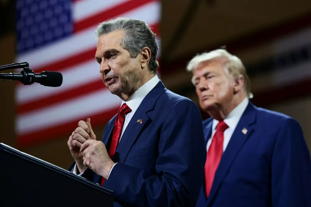 Rick Jackson, a Republican candidate for governor of Georgia, speaks alongside U.S. President Donald Trump during an event at Wheeler High School in Marietta, Georgia, U.S., July 22, 2026. REUTERS/Evelyn Hockstein