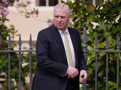 FILE - Britain's Andrew Mountbatten-Windsor, formerly known as Prince Andrew, looks round as he leaves after attending the Easter Matins Service at St. George's Chapel, Windsor Castle, England, April 20, 2025. (AP Photo/Kirsty Wigglesworth, File)