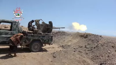 FILE PHOTO: A pro-Saudi-backed Yemeni government fighter fires a vehicle-mounted weapon during what government forces say was an advance against the Iran-backed Houthis, near Dhubab, Taiz Governorate, Yemen, in this still image taken from video released October 5, 2026.  Southern Giants Brigades/Handout via REUTERS  THIS IMAGE HAS BEEN SUPPLIED BY A THIRD PARTY. MUST NOT OBSCURE LOGO.  VERIFICATION: - Location partially verified from the runway, airport control tower, road layout, shape of the mountains and coastline, that matched topography mapping, satellite and archive imagery. - Date could not be independently verified. - No older versions found posted online before October 5./File Photo