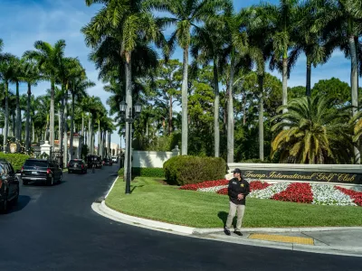 FILE - The motorcade for President Donald Trump arrives at Trump International Golf Club, Jan. 2, 2026, in West Palm Beach, Fla. (AP Photo/Alex Brandon, File)