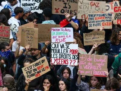 Protesters march during a demonstration by French high school students in Marseille, as part of a nationwide day of protests and blockades, expressing anger over overcrowded classrooms, teacher shortages and dilapidated school buildings, which students blame on years of underinvestment, in Marseille, France, October 8, 2026. One of the placards reads: "Who will fight for high school students' rights?". REUTERS/Manon Cruz