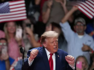 President Donald Trump dances at a campaign rally at the Freeman Coliseum in San Antonio, Wednesday, Oct. 7, 2026. (AP Photo/Eric Gay)