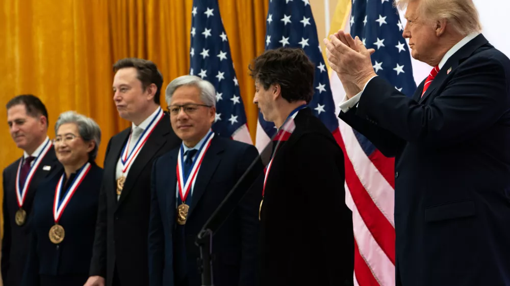 President Donald Trump, from right, applauds after presenting the National Medal of Science to Google co-Founder Sergey Brin, Nvidia CEO Jensen Huang, Elon Musk, Lisa Su, CEO of Advanced Micro Devices, and the National Medal of Technology and Innovation to Dell CEO Michael Dell at the U.S. Institute of Peace, Thursday, Oct. 8, 2026, in Washington. (AP Photo/Julia Demaree Nikhinson)