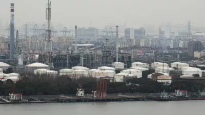 FILE PHOTO: Oil storage tanks and facilities of a Sinopec plant in Shanghai, China, March 26, 2026. REUTERS/Go Nakamura/File Photo