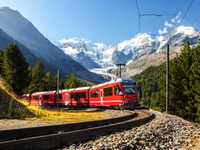 colourful summer daytime images small train in large landscape