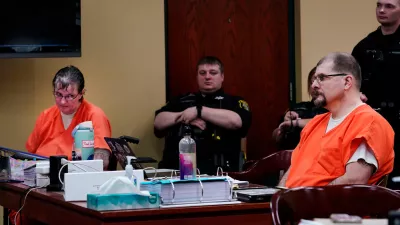 Cortney Bartholomew, left, sits at the defense table with her husband Bradley Bartholomew during a preliminary examination for them at the Wexford County Circuit Court House courtroom of 84rth District Judge Corey Wiggins on Friday, Sept. 18, 2026 as they are accused of killing Rebecca Park and her unborn baby.
