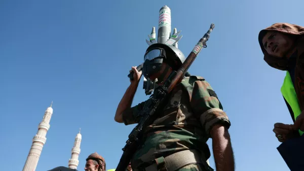 A Houthi supporter wearing a military uniform attends a rally to show support for the movement as fighting intensifies across several Yemeni fronts, in Sanaa, Yemen October 9, 2026. REUTERS/Mohammed al-Mahdi