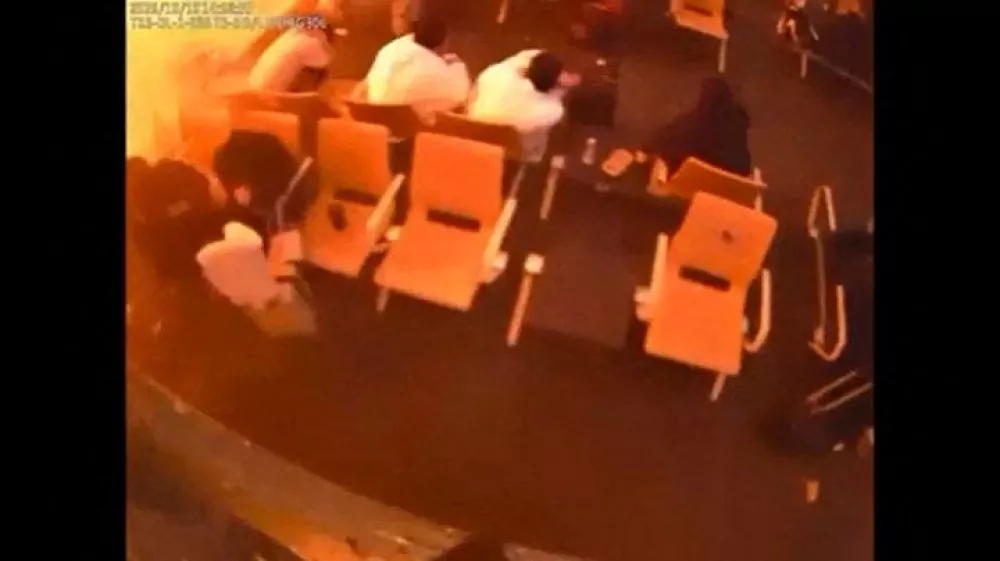 Surveillance footage shows people sitting in a waiting area reacting at the moment of an attack, in a location given as King Khalid International Airport in Riyadh, Saudi Arabia, October 10, 2026, in this frame from a handout video. Saudi Ministry of Media/Handout via REUTERS  THIS IMAGE HAS BEEN SUPPLIED BY A THIRD PARTY. OVERLAY FROM SOURCE. VERIFICATION: Reuters verified the location from the CCTV of the boarding gate from the infrastructure and furniture that matched the archive and satellite imagery from terminal 3 at King Khalid International Airport. The location of the CCTV that showed the people seated was not verified. The date the video was filmed was confirmed with the timestamp on the surveillance footage. The Saudi Civil Aviation Authority said the airport operations were suspended after an attack that left many injured on October 10. No old results were found posted online before October 11.