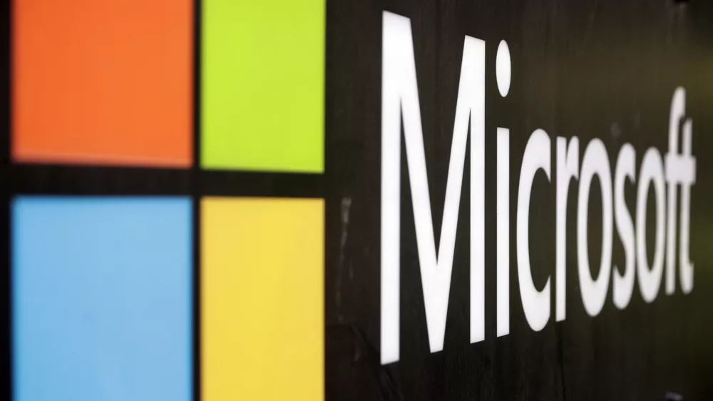 FILE - The Microsoft company logo is displayed at their offices in Sydney, Australia, on Wednesday, Feb. 3, 2021. Microsoft has closed on its approximately $16 billion acquisition of speech recognition company Nuance. The deal, which was announced last year, helps Microsoft Corp. get more entrenched into hospitals and the health care industry through Nuance&acirc;&euro;&trade;s widely used medical dictation and transcription tools. (AP Photo/Rick Rycroft, File)