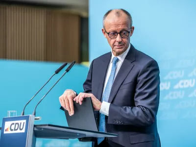 German Chancellor Friedrich Merz attends the press conference following the CDU Federal Executive Committee meeting and the special session of the party presidium, in Berlin Monday, Oct. 12, 2026. (Michael Kappeler/dpa via AP)