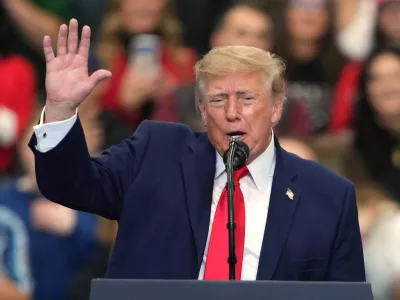 President Donald Trump speaks at a campaign rally at the Curtis D. Menard Memorial Sports Center, Tuesday, Oct. 13, 2026, in Wasilla, Alaska. (AP Photo/Lindsey Wasson)
