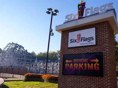 Attractions are seen at Six Flags Over Georgia, about 15 miles (24 kilometers) northwest of Atlanta, Tuesday, Oct. 13, 2026. (AP Photo/Mike Stewart)