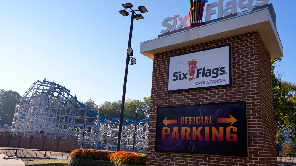 Attractions are seen at Six Flags Over Georgia, about 15 miles (24 kilometers) northwest of Atlanta, Tuesday, Oct. 13, 2026. (AP Photo/Mike Stewart)