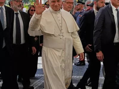 Pope Leo XIV arrives at the Agostino Gemelli Polyclinic in Rome, Tuesday, Oct. 13, 2026, where he's expected to be operated to remove a lung nodule. (AP Photo/Alessandra Tarantino)