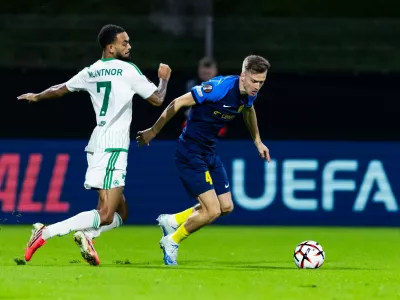 Jaden Montnor of FC Omonia vs Lukasz Bejger of NK Celje during football match between NK Celje (SLO) and FC Omonia (CYP) in league phase, Matchday 2 of UEFA Europa League 2026/27, on October 15, 2026 in Stadion Z'Dezele, Celje, Slovenia. Photo by Nik Moder // Moder Photo Agency,Image: 1143658541, License: Rights-managed, Restrictions:, Model Release: no 