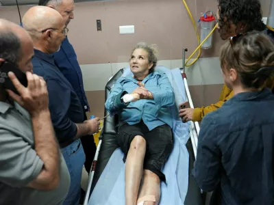 Heidi Levine, a photojournalist with the Washington Post, speaks to journalists at the hospital after sustaining multiple injuries during an attack by Israeli militant settlers on Palestinians harvesting olives, in Ramallah in the Israeli-occupied West Bank, October 16, 2026. REUTERS/Ali Sawafta