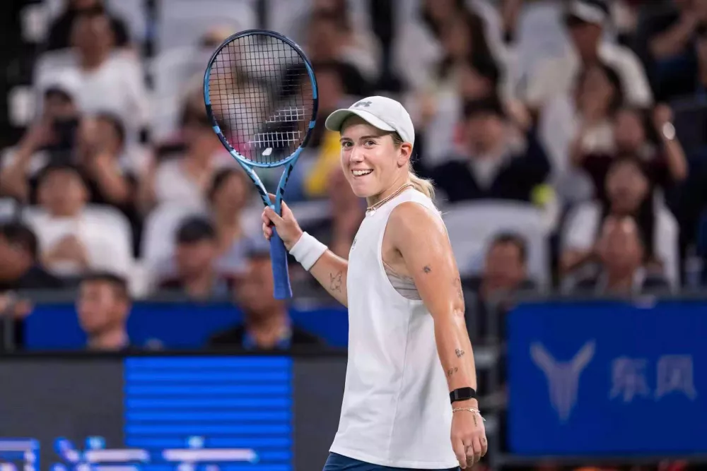 Sonay Kartal of Britain celebrates after defeating against Jelena Ostapenko of Latvia in a women's singles semifinal match during the 2026 Wuhan Open tennis tournament in Wuhan in central China's Hubei Province on Saturday, Oct. 17, 2026. (Chinatopix Via AP)