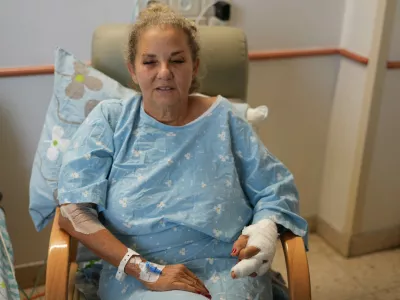 Washington Post photojournalist Heidi Levine receives treatment at Beilinson Hospital in Petah Tikva, Israel, Sunday, Oct. 18, 2026, after being injured in an attack by Israeli settlers while covering clashes that erupted during the Palestinian olive harvest in the West Bank village of Abu Falah on Friday. (AP Photo/Ariel Schalit)