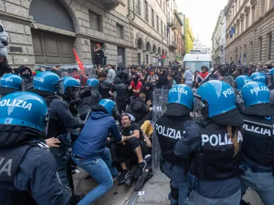 Police confront "Italia in Piazza" protesters in Milan, Italy, on Saturday, Oct. 17, 2026. (Stefano Porta/LaPresse via AP)