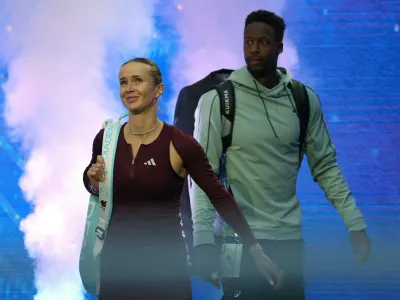 NEW YORK, NEW YORK - AUGUST 26: Gael Monfils of France and Elina Svitolina of Ukraine walk onto the court prior to the Mixed Doubles Semifinal of the US Open against Belinda Bencic of Switzerland and Flavio Cobolli of Italy at USTA Billie Jean King National Tennis Center on August 26, 2026 in New York City. Sarah Stier,Image: 1128668124, License: Rights-managed, Restrictions:, Model Release: no 