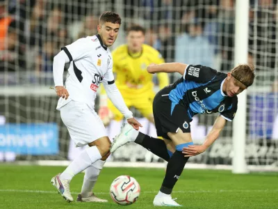 Lokeren's Jordi Palacios and Club's Tian Nai Koren fight for the ball during a soccer match between Club Brugge and KSC Lokeren, Saturday 17 October 2026 in Brugge, a game in the 1/16 final of the Croky Cup Belgian cup competition.,Image: 1144187564, License: Rights-managed, Restrictions:, Model Release: no 