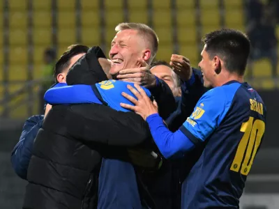 Soccer Football - UEFA Europa League - Celje v RB Salzburg - Stadion Z'dezele, Celje, Slovenia - October 22, 2026 Celje's Armandas Kucys celebrates scoring their second goal with teammates REUTERS/Ziga Zivulovic Jr.