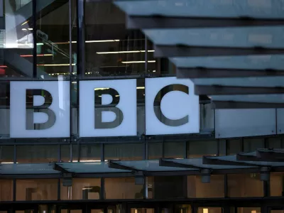 FILE PHOTO: The BBC logo outside the BBC Broadcasting House after Director General of BBC Tim Davie and Chief Executive of BBC News Deborah Turness resigned following accusations of bias at the British broadcaster, including in the way it edited a speech by U.S. President Donald Trump, in London, Britain, November 10, 2025. REUTERS/Jack Taylor/File Photo