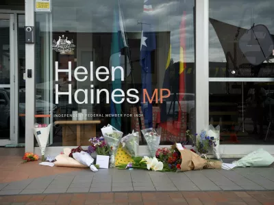 Tributes and flowers lie outside the electoral office of independent Australian lawmaker Helen Haines, who was deliberately struck by a car outside her office on Monday in Wangaratta, Australia, October 20, 2026. AAP/James Ross/via REUTERS  ATTENTION EDITORS - THIS IMAGE WAS PROVIDED BY A THIRD PARTY. NO RESALES. NO ARCHIVE. AUSTRALIA OUT. NEW ZEALAND OUT. NO COMMERCIAL OR EDITORIAL SALES IN NEW ZEALAND. NO COMMERCIAL OR EDITORIAL SALES IN AUSTRALIA.