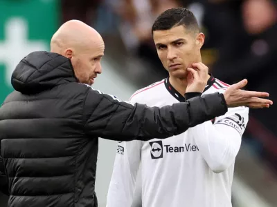 FILE PHOTO: Soccer Football - Premier League - Aston Villa v Manchester United - Villa Park, Birmingham, Britain - November 6, 2022 Manchester United manager Erik ten Hag talks to Cristiano Ronaldo before the start of the second half REUTERS/Carl Recine EDITORIAL USE ONLY. No use with unauthorized audio, video, data, fixture lists, club/league logos or 'live' services. Online in-match use limited to 75 images, no video emulation. No use in betting, games or single club /league/player publications. Please contact your account representative for further details./File Photo