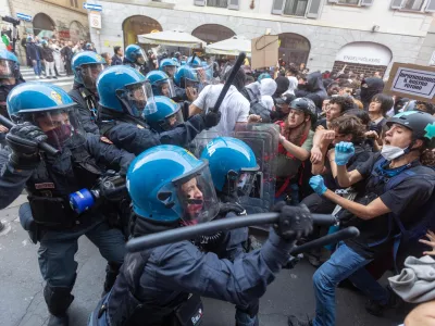 Police confront "Italia in Piazza" protesters in Milan, Italy, on Saturday, Oct. 17, 2026. (Stefano Porta/LaPresse via AP)