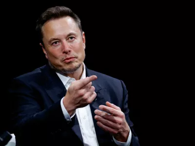 FILE PHOTO: Elon Musk, Chief Executive Officer of SpaceX and Tesla and owner of X, formerly known as Twitter, gestures as he attends the Viva Technology conference dedicated to innovation and startups at the Porte de Versailles exhibition centre in Paris, France, June 16, 2023. REUTERS/Gonzalo Fuentes/File Photo
