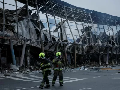 Rescuers work at the site of a shopping centre hit by a Russian missile attack, amid Russia's attack on Ukraine, in Kyiv, Ukraine October 22, 2026. REUTERS/Gleb Garanich