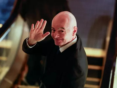 FIFA president Gianni Infantino gestures to reporters as he leaves from a venue for the Asian Football Confederation (AFC)'s extraordinary congress in Tokyo, Japan, October 23, 2026. REUTERS/Kim Kyung-Hoon