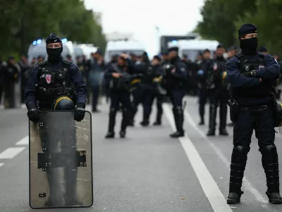 Officers of the French CRS riot police stand guard during a protest organised by student collectives and trade unions in Paris, France, October 22, 2026. REUTERS/Abdul Saboor
