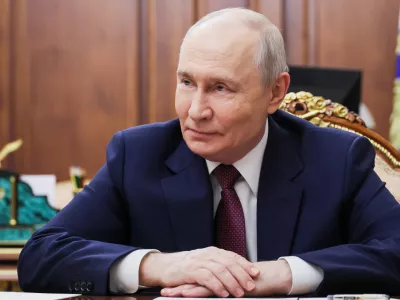 Russian President Vladimir Putin listens to Vladivostok Mayor Konstantin Shestakov during their meeting at the Kremlin in Moscow, Thursday, Oct. 22, 2026. (Mikhail Metzel/Sputnik, Kremlin Pool Photo via AP)