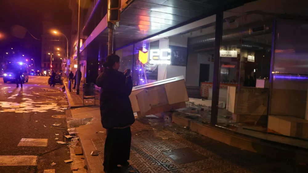 A vandalised store during a student's protest in Barcelona, Spain, October 24, 2026. REUTERS/Bruna Casas