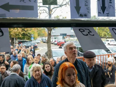 People queue outside a polling station to vote during the parliamentary election in Novi Sad, Serbia, October 25, 2026. REUTERS/Uros Arsic