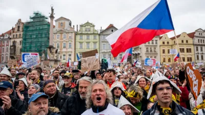 People attend a protest entitled "Hands Off the Media!" staged by Million Moments for Democracy group, on the Old Town Square in Prague, Czech Republic, Sunday, Oct. 25, 2026.  (Ondrej Deml/CTK via AP)