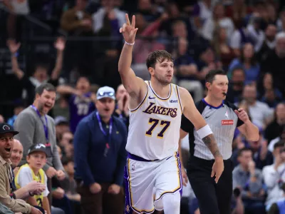 Oct 25, 2026; Salt Lake City, Utah, USA; Los Angeles Lakers guard Luka Doncic (77) reacts after making a shot against the Utah Jazz during the second half at Delta Center. Mandatory Credit: Rob Gray-Imagn Images