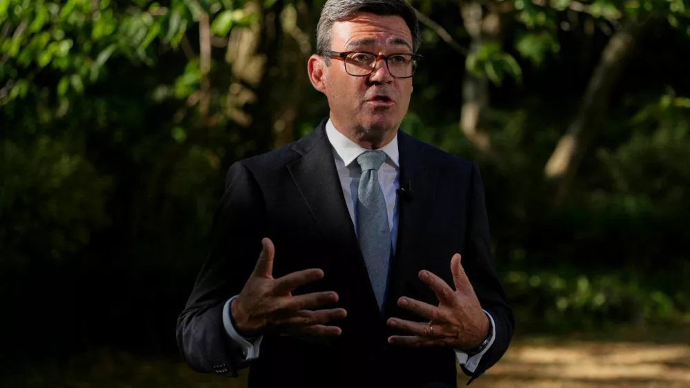 FILE PHOTO: Britain's Prime Minister Andy Burnham speaks to the media after chairing a COBR meeting at Downing Street on the UK's ongoing response to extreme heat, wildfires and drought, in London, Britain, Wednesday, Aug. 12, 2026.  Kin Cheung/Pool via REUTERS/File Photo