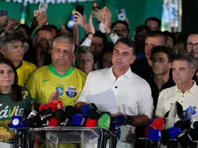 FILE - Opposition presidential candidate Sen. Flavio Bolsonaro speaks after the presidential election runoff in Brasilia, Brazil, Oct. 25, 2026. (AP Photo/Eraldo Peres, File)